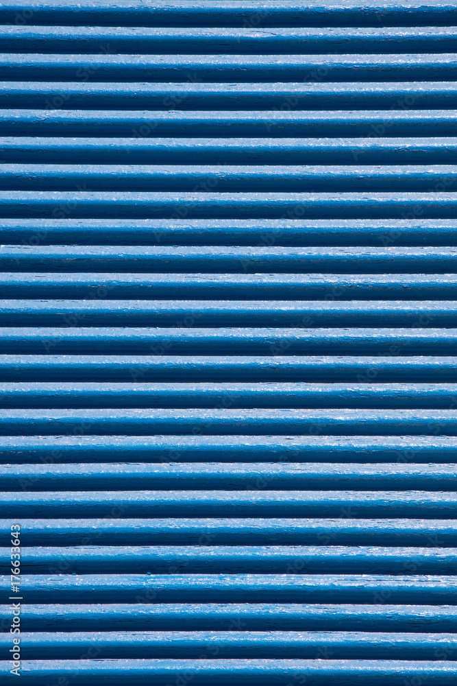 detail of blue shortcullis (rolling shutter), Santorini Greece. detail of blue shortcullis (rolling shutter), Santorini Greece.