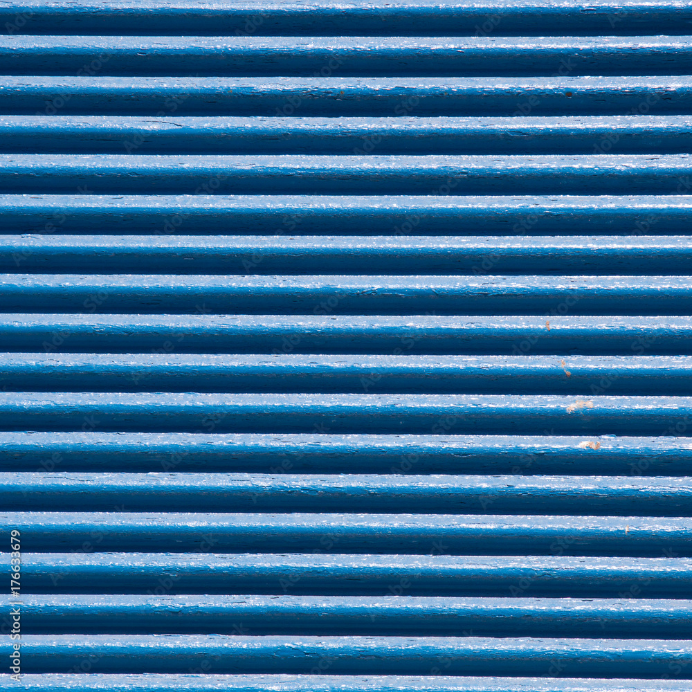 detail of blue shortcullis (rolling shutter), Santorini Greece. detail of blue shortcullis (rolling shutter), Santorini Greece.