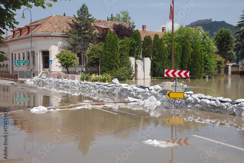 Flooded street and houses photo