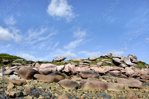 Famous pink granite rocks on the coast of Ploumanac'h (côte de granite rose in french), village in the commune of Perros-Guirec. 