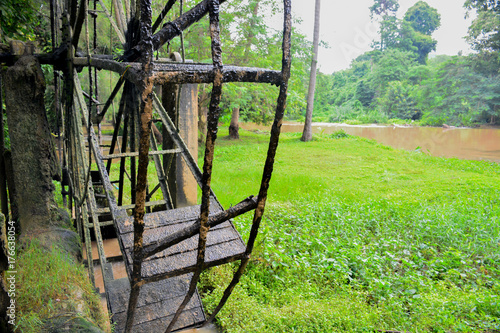 The old steel water turbine,Thai style in a forest