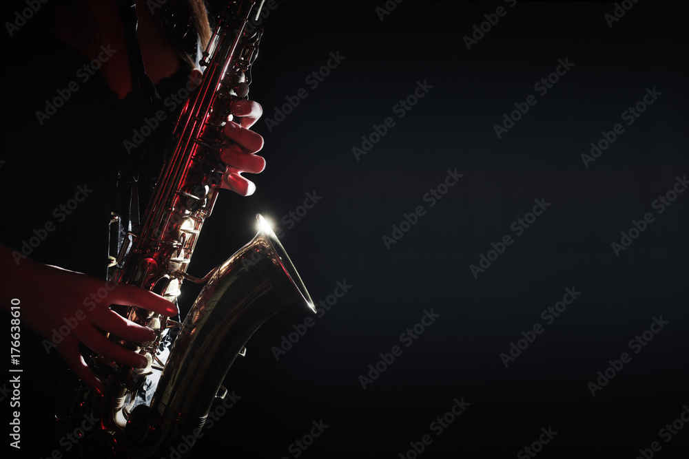 Obraz premium Saxophone Player Saxophonist hands playing jazz