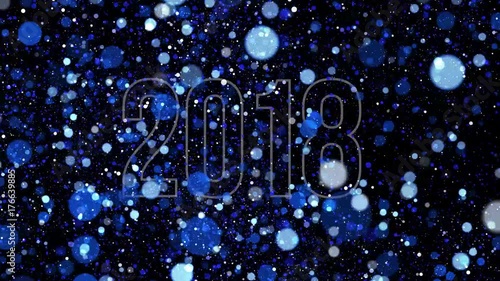 New year background - lot of blue particles randomly fly around digits 2018. 3D rendering - computer generated blizzard. Cartoon snow moving on the wind, bright dots on dark. With alpha-channel. photo