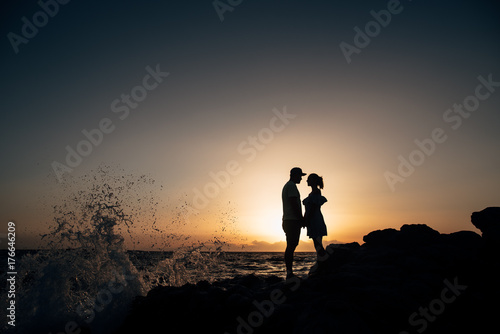 silhouette of a couple at sunset