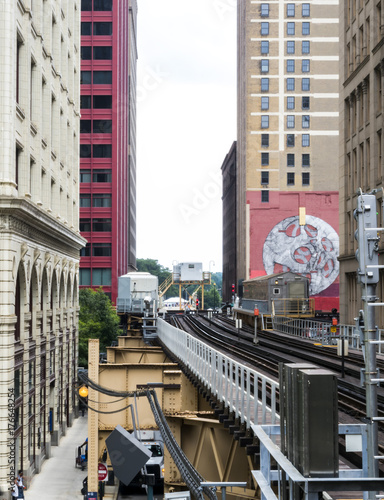 The Loop - elevated train line between buildings - Chicago, Illinois, USA photo