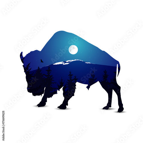 Silhouette of bison with night mountain landscape.