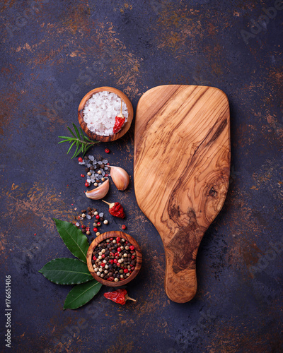 Cutting board with herbs and spices.