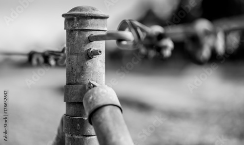 Fototapeta Naklejka Na Ścianę i Meble -  Closeup of fence pole post in black and white
