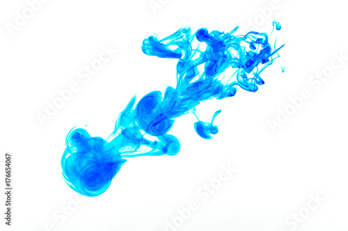 Splash of blue paint in water