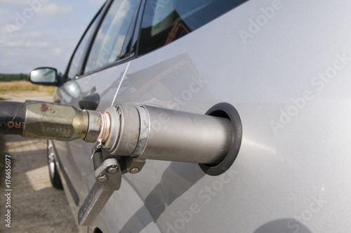 Factory fitted lpg Ford Focus refuelling at petrol station © Derek