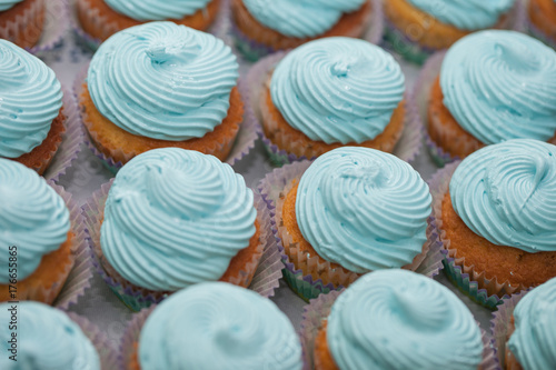 Closeup of blue cupcakes. Selective focus. Sweet dessert tasty food concept muffin baby shower treat. Sweettooth. Bakery