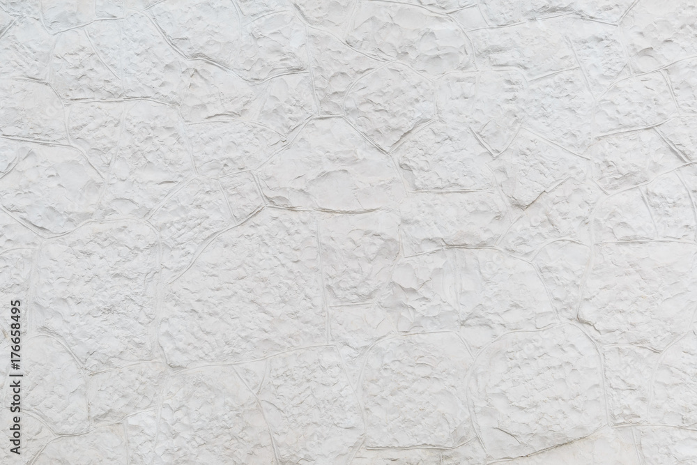 Surface is finished with white relief decorative plaster as a background Surface is finished with white relief decorative plaster as a background