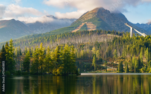 Fototapeta Naklejka Na Ścianę i Meble -  Mountain lake Strbske pleso in National Park High Tatra, Slovakia, Europe. Ski resort in summer and autumn time. Peaceful nature wallpaper. Tranquil vacations travel concept.