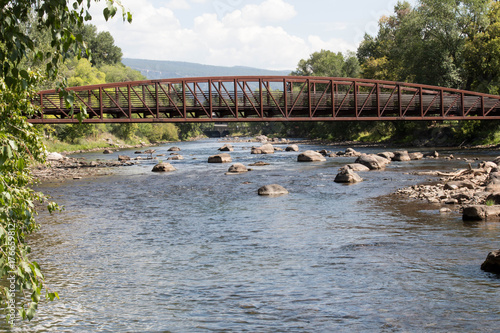 Arch of a pedestrian bridge over the Animas river in Durango. Colorado