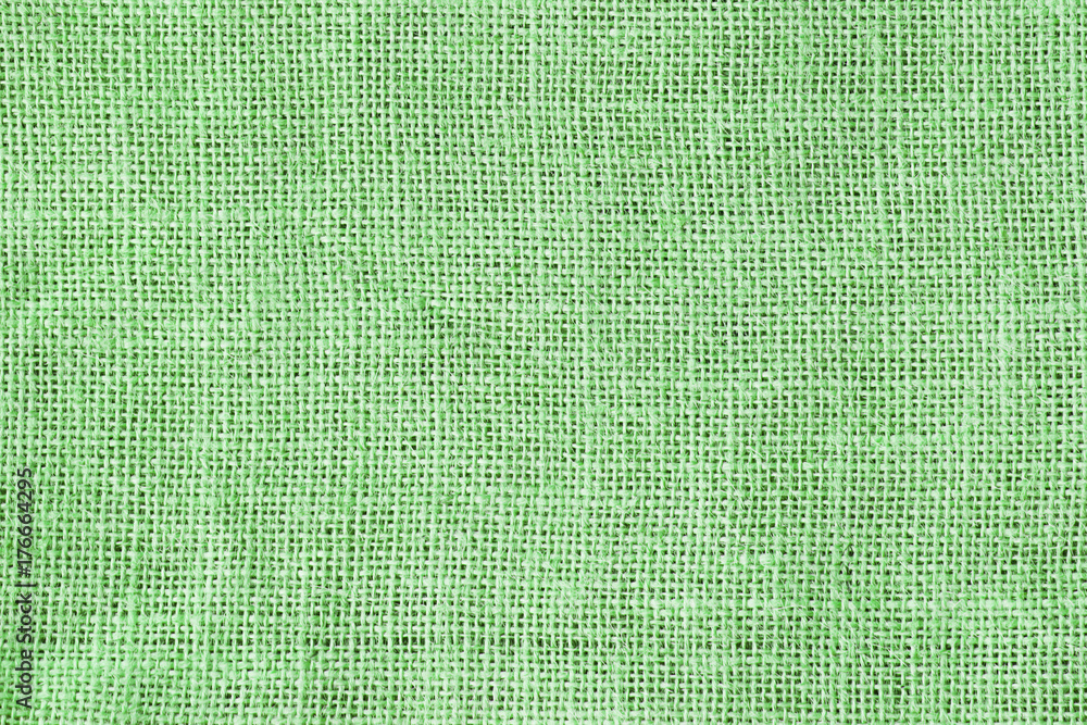 Fototapeta premium Green light sackcloth texture Christmas background