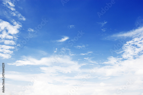 Soft white clouds against blue sky background and empty space for your design, beautiful of nature