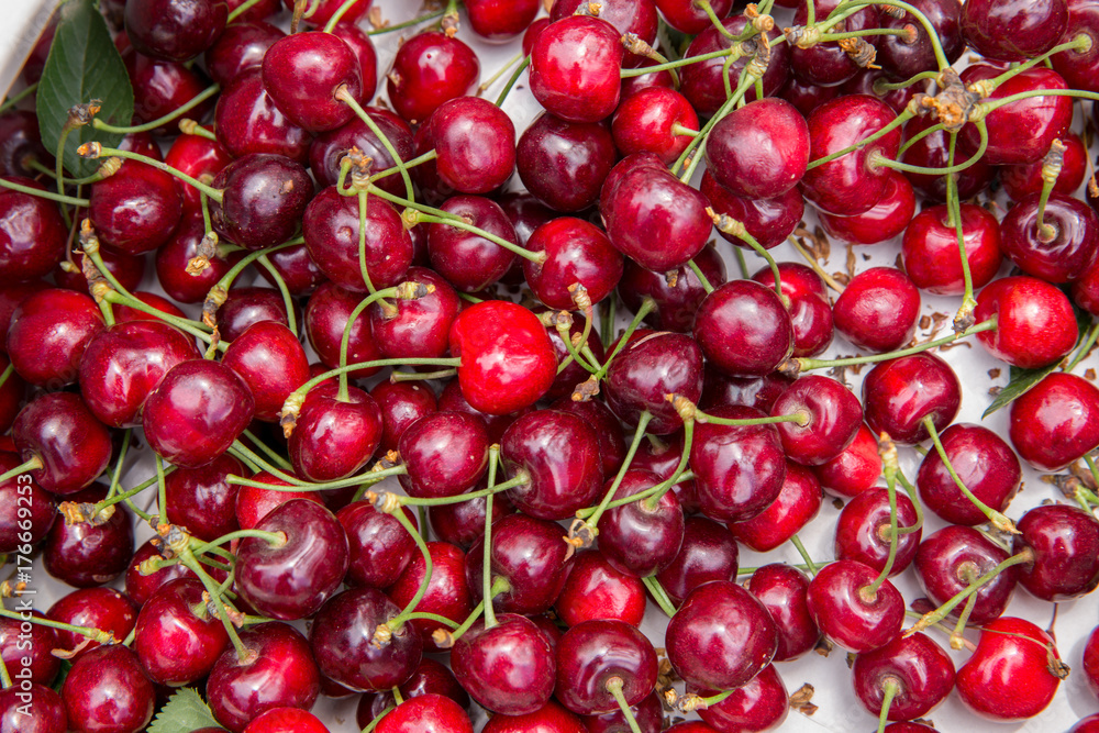 Sweet cherry. background. Group of Cherries forming a texture. cherry fruits. Sweet cherry. background. Group of Cherries forming a texture. cherry fruits.