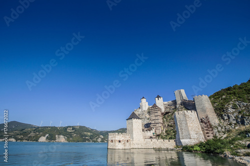 Golubac Fortress (Golubacka trvdjava, or Goluback Grad) taken during a sunny afternoon. The Golubac Castle was a medieval fortified town on the Danube River,  downstream from current city of Golubac photo