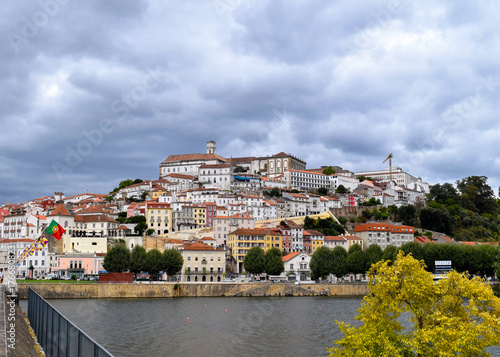 Historic university hill of Coimbra from the across the Mondego River, Portugal