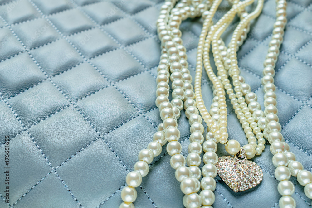 Pearls Isolated on Quilted Blue Background