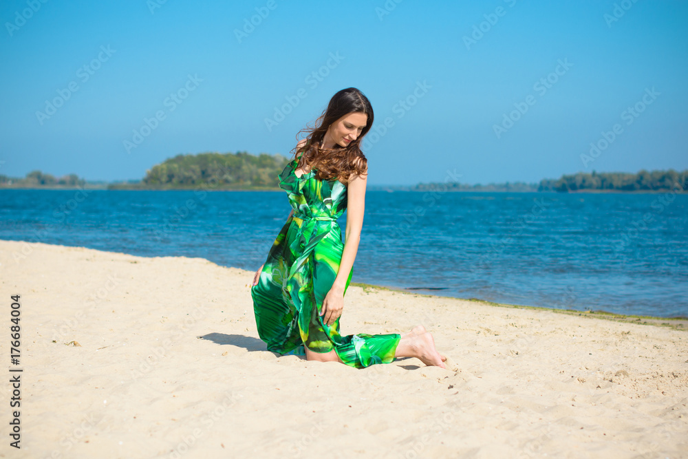 Mature thin woman walks through a small town with peace and faith in herself and her bright future. The concept of women's life after forty years Mature thin woman walks through a small town with peace and faith in herself and her bright future. The concept of women's life after forty years