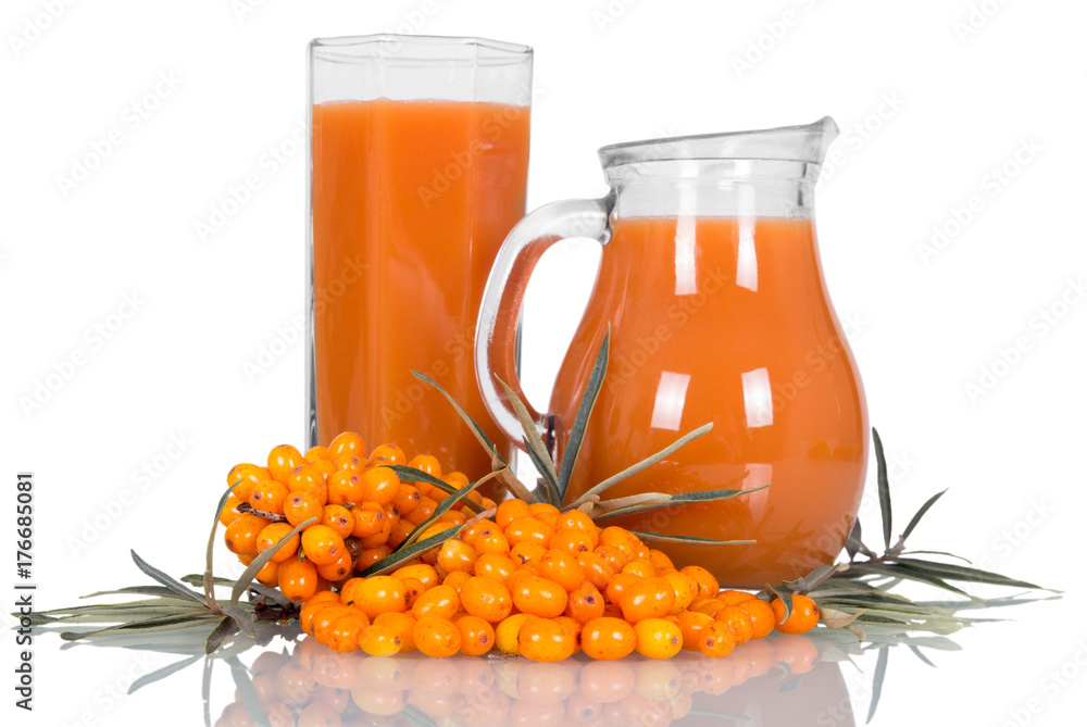 Glass of juice from sea-buckthorn berries is isolated on white. Glass of juice from sea-buckthorn berries is isolated on white.