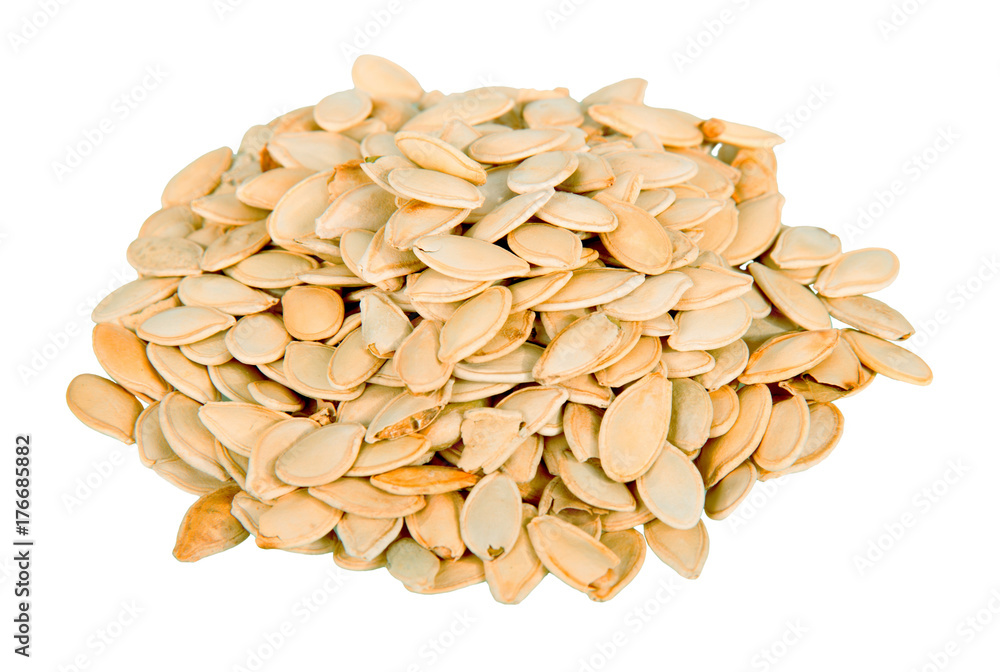 Pile of pumpkin seeds isolated on white. Pile of pumpkin seeds isolated on white.
