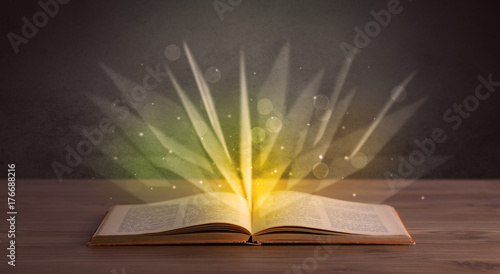 Yellow lights over book © ra2 studio
