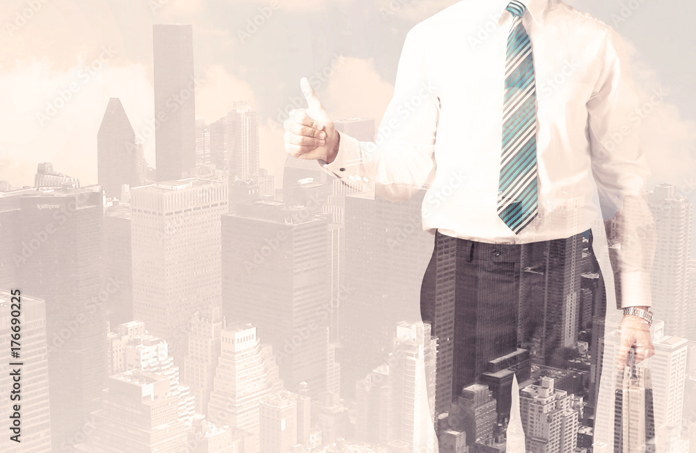 Handsome business man with overlay cityscape Handsome business man with overlay cityscape