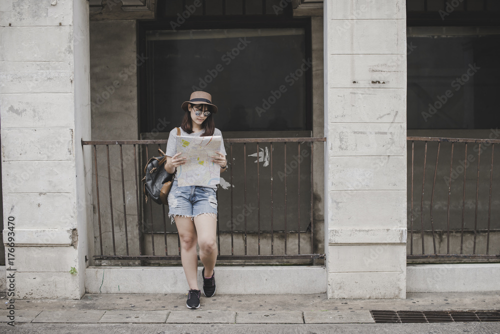 young women with backpack travel architecture location in thailand young women with backpack travel architecture location in thailand