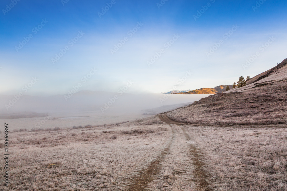 Country Road in a fog in the mountains. Country Road in a fog in the mountains.
