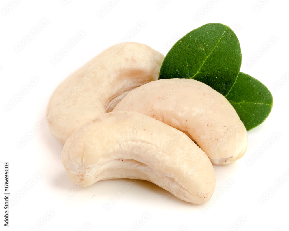 cashew nuts with leaf isolated on white background. macro cashew nuts with leaf isolated on white background. macro