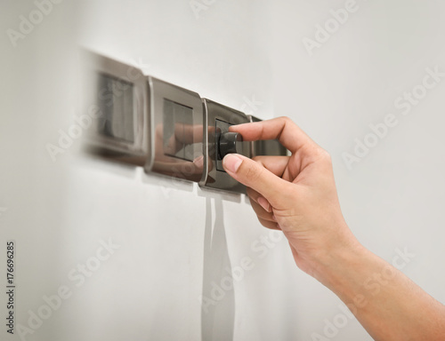 Grey light dimmer switch.