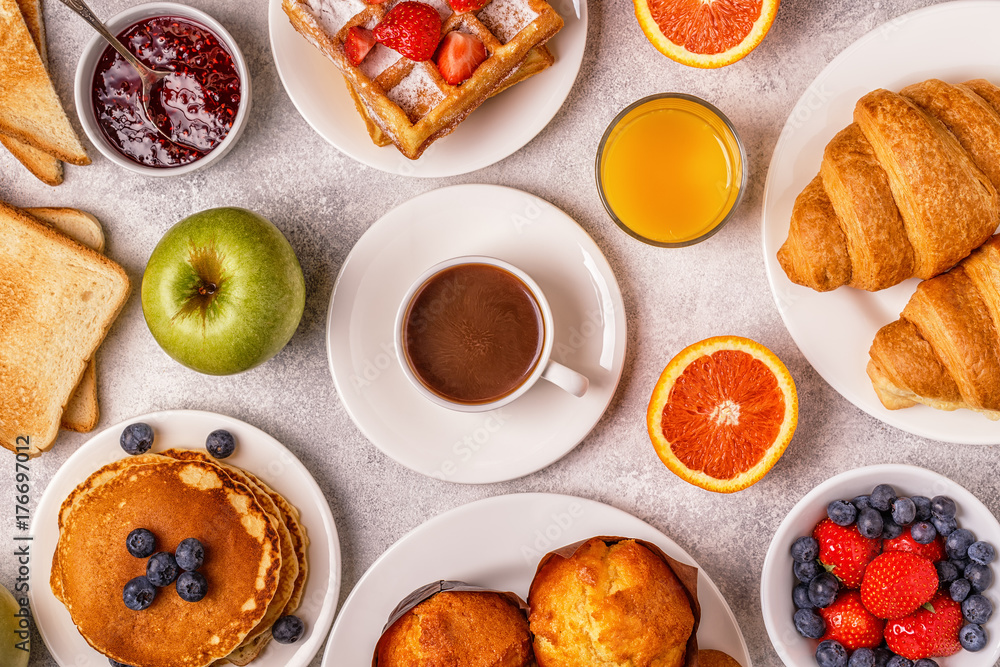 Delicious breakfast on a light table. Delicious breakfast on a light table.