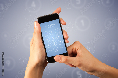 Wallpaper Mural Female hand holding smartphone Torontodigital.ca