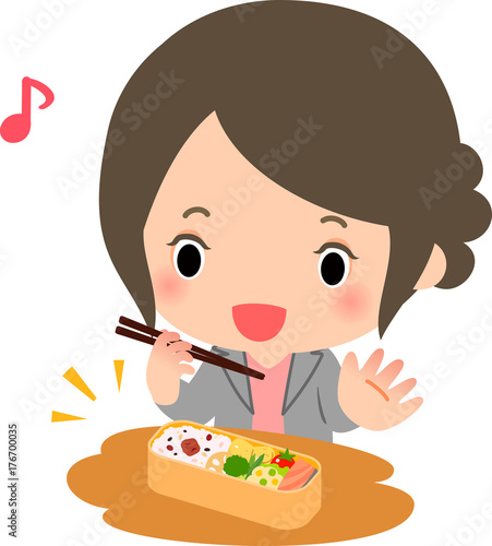 お弁当を食べるスーツの女性