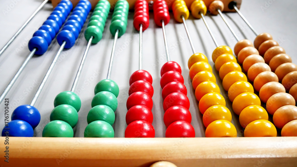 Perspective Abacus for Counting Practice, Beads Aligned Diagonally on Gray Background Perspective Abacus for Counting Practice, Beads Aligned Diagonally on Gray Background