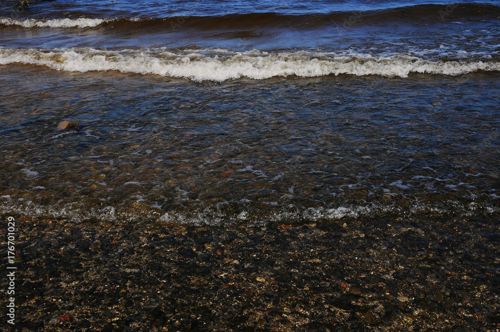 Waves near stony shore close up Waves near stony shore close up