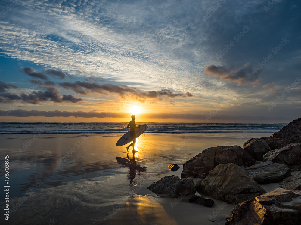 Surfer sunrise silhouette
