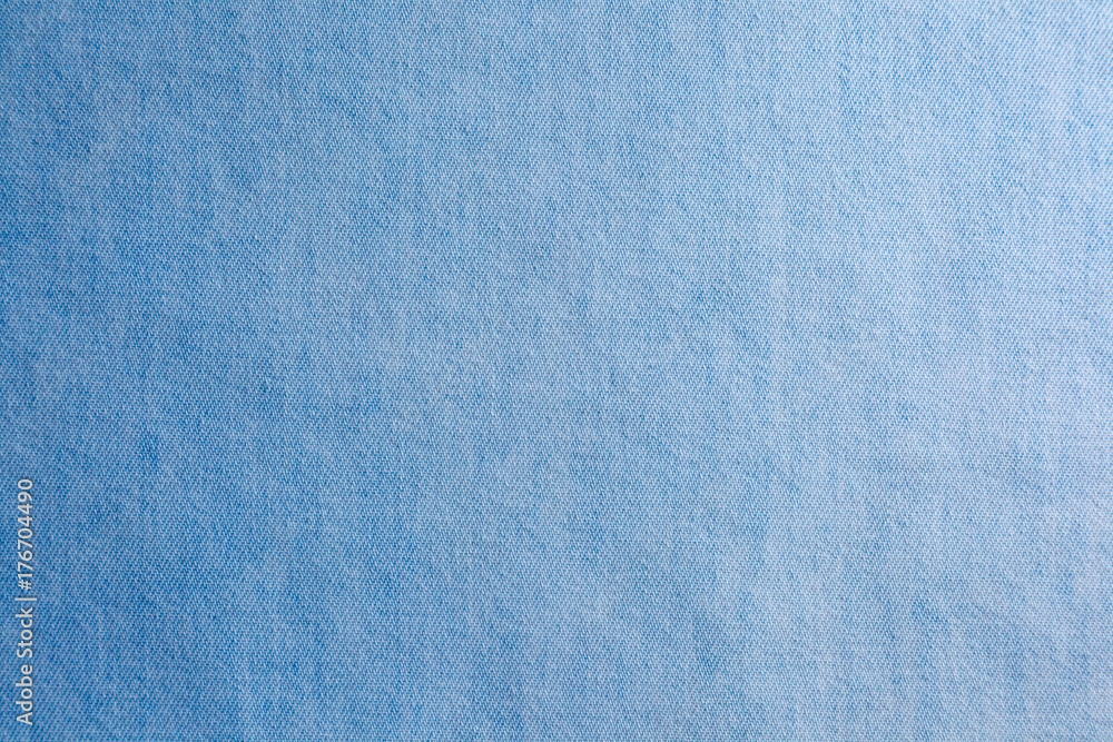 Naklejka premium The image of textures of blue denim fabrics for the background, patterns and creativity.