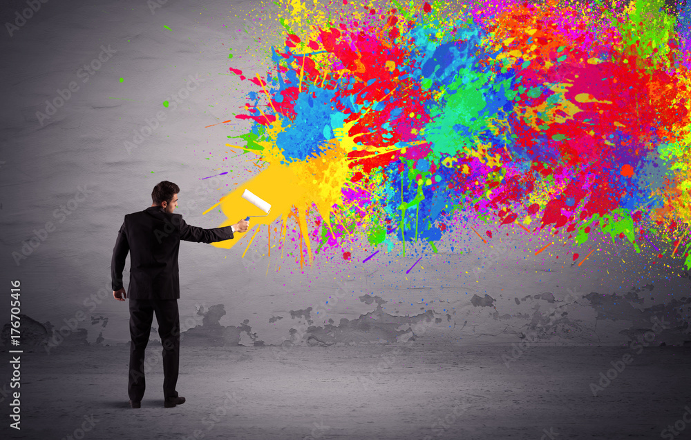 Sales person painting colorful splatter Sales person painting colorful splatter