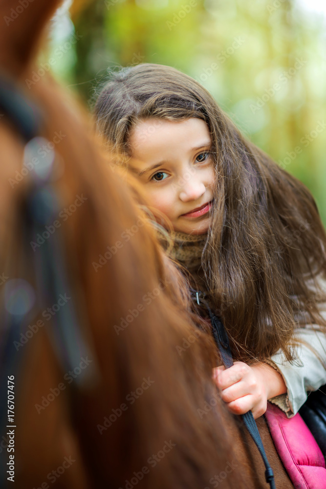 beautiful girl riding a horse. beautiful girl riding a horse.