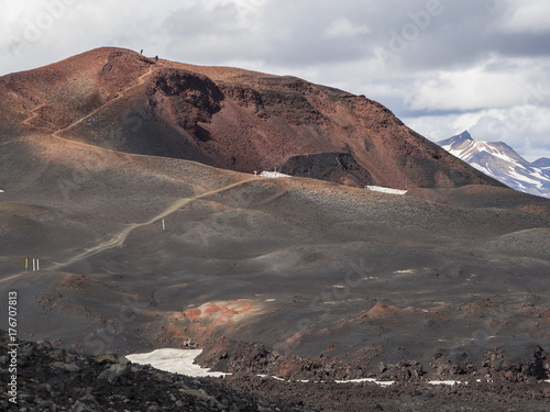 Brown lava fields and hiking trail around the volcano Eyjafjallajokull photo