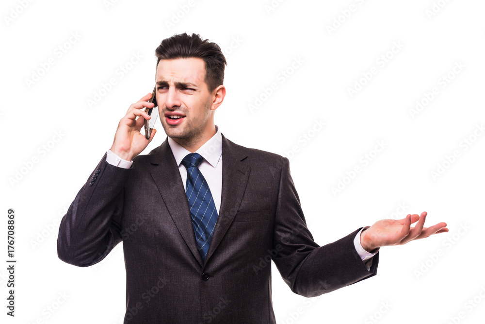 Elegant and modern business man talking on his phone on white Elegant and modern business man talking on his phone on white
