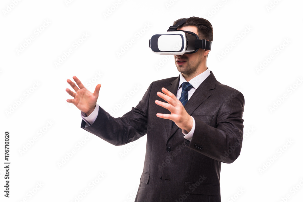 Young handsome businessman in black suit wearing virtual reality goggles Young handsome businessman in black suit wearing virtual reality goggles