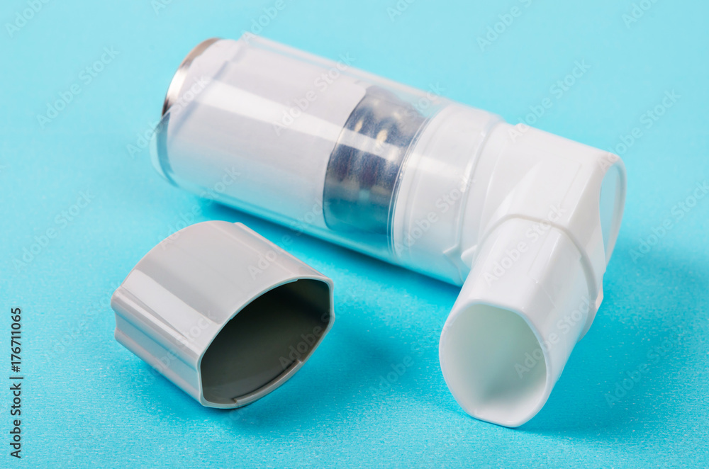 white asthma inhaler. white asthma inhaler.