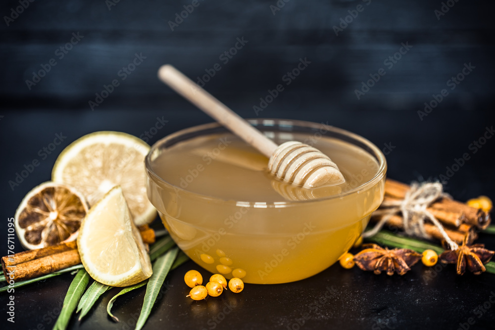 Fototapeta premium composition of honey with lemon