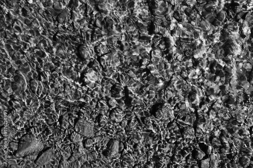 texture of water on stones in a crooked stream texture of water on stones in a crooked stream