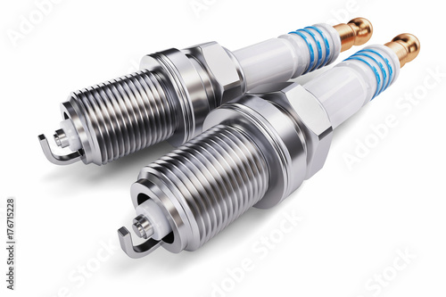 Two spark plugs on a white background