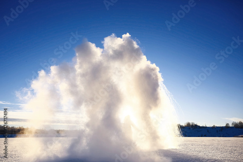 Snow geyser beating with great force